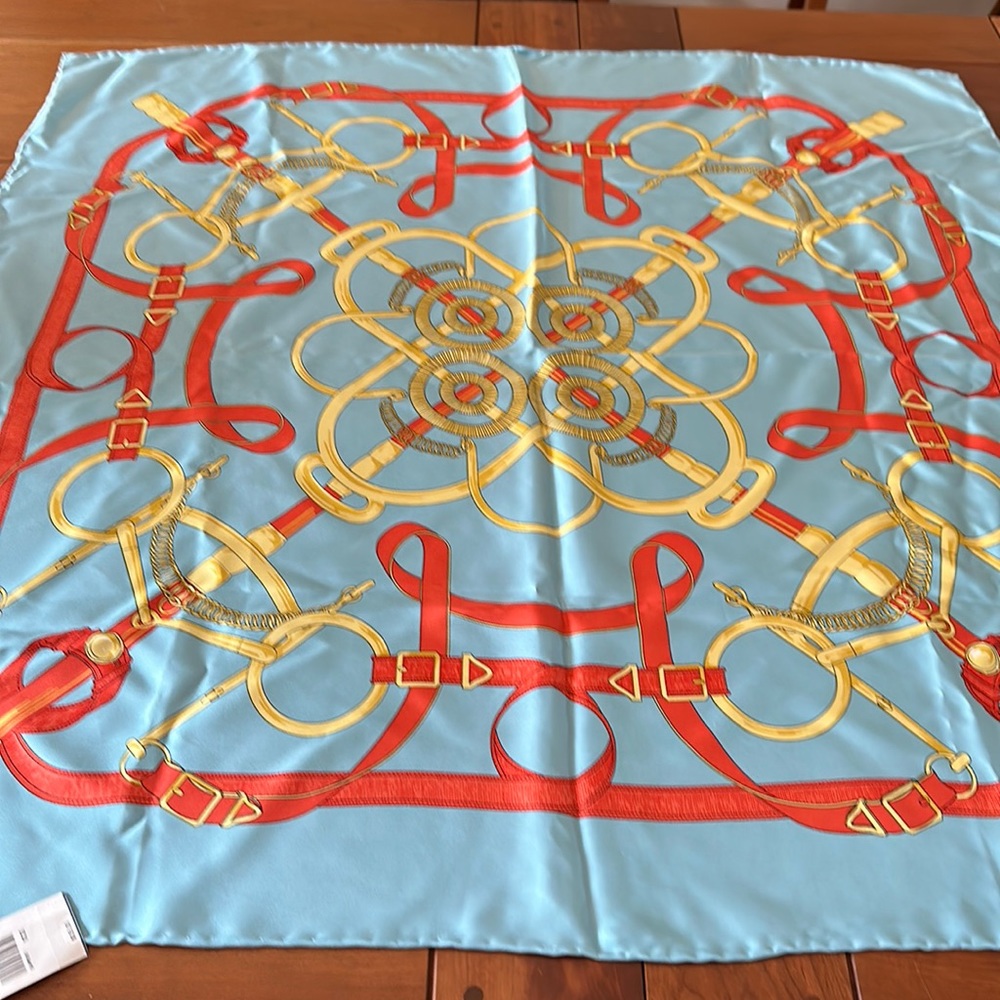 JMcLaughlin 100% silk scarf. Light blue, orange and gold, carriage style. NWT.